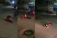 Video viral drunk girl sits sleeps rolls on the road in pune