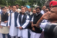 Rahul gandhi leads protest against suspension of congress mps