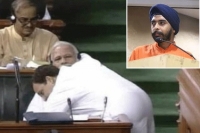 Bjp leader blames tantrik tactics for rahul gandhi hugging pm modi