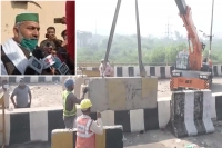 Police barricades being removed from ghazipur farmers agitation site