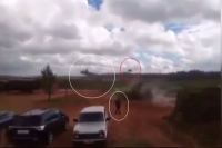 Zapad war games russian military helicopter fires rocket at spectators