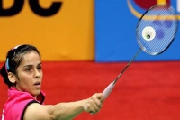 Saina nehwal wins first round thriller against busanan in denmark open