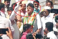 Minister dk shivakumar loses his cool hits man trying to take selfie