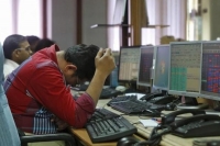 Sensex falls to three week low on disappointing results