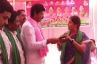 Trs mla snatches mike from party mp during protest in telangana s mahabubabad
