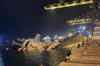 Video egyptian ship tips over in turkey port while attempting to unload cargo