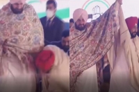 Charanjit channi touches sidhu s feet soon after cong announced him as cm candidate