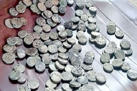 Antique silver coins found in farm in vikarabad