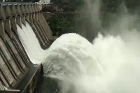 Officials opened three gates to released water from srisailam dam