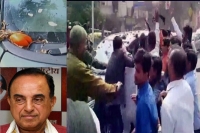 Subramanian swamy s car egged shown black flags in kanpur