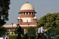 India s top court halts use of controversial sedition law in rebuke to the government
