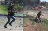 Photographer puts down camera runs to rescue boy wounded in syrian bus bombing
