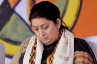 Smriti irani s demotion to ministry of textiles may be a covert promotion