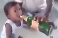 Father feeding alcohol to toddler in tamil nadu