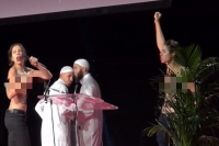 Femen stages topless protest at muslim women s fair