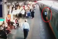 Passenger falls between platform and moving train pilot applies emergency brakes