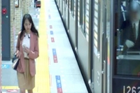 Japanese girl hit by moving train while using smartphone