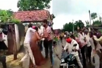 Woman stripped beaten up in madhya pradesh village four men arrested