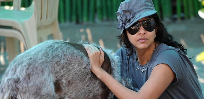 Manchu lakshmi plays with her pet dog